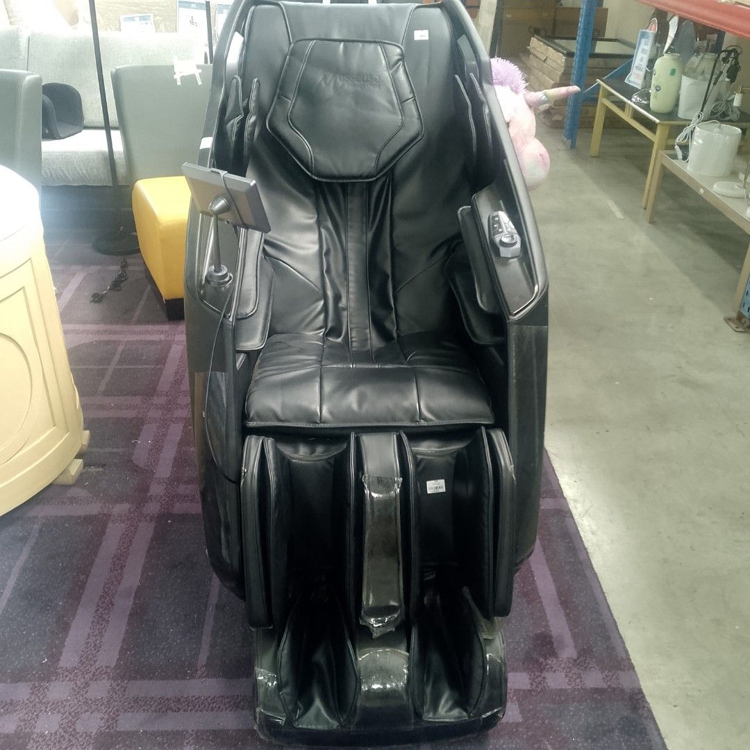 Black Leather Full Body Massage Chair (Category: Massage Devices) located in Manila. Submitted by cleverwolf.07545a (Listing ID 1452707498, Image 1). Description: - Black leather full body massage chair - Integrated foot massager - Convenient arm controls - Multiple massage functions for ultimate relaxation - Perfect for unwinding after a long day - In good, working condition - Pickup only.