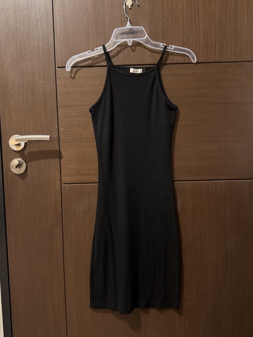 Black Ribbed Body con Dress Size 6 (Category: Dresses) located in Quezon City. Submitted by ianne.declutter (Listing ID 1452813449, Image 1). Description: - Brand: Chicabooti - Style: Black ribbed mini dress - Features: Spaghetti straps, high neckline - Material: Stretchy - Measurements: Approx. 12 inches (chest), 32 inches (length) - Versatility: Great for layering or wearing on its own Stretchy material.