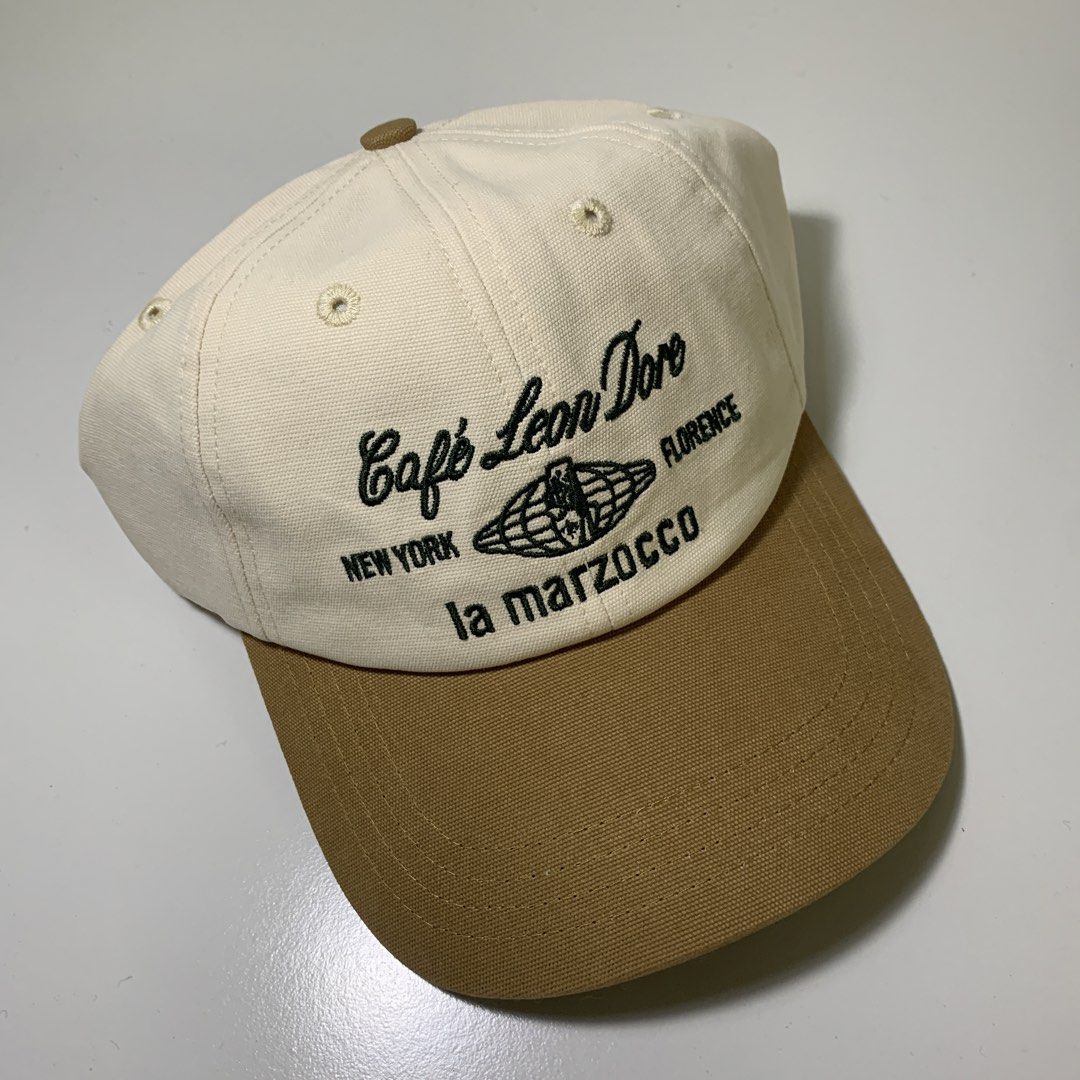 Cafe Leon Dore La Marzocco pristine hat (Category: Caps & Hats) located in Pasig City. Submitted by paymelikelandlord (Listing ID 1452772039, Image 3). Description: SALE ONLY! Cafe Leon Dore / Aime Leon Dore hat Adjustable One size fits all Excellent condition new No hidden issue no flaw Back to 6000 Rfs need funds Dm us to purchase 📥.
