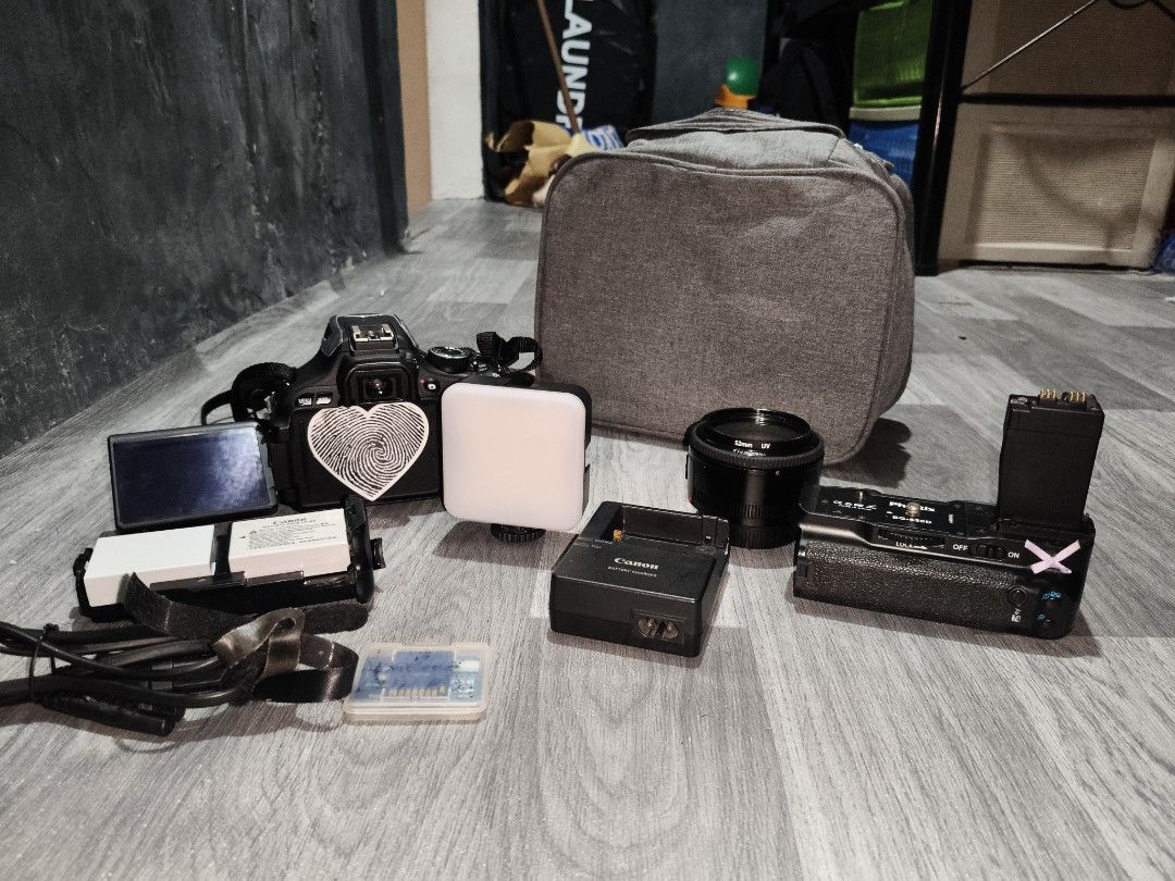 Canon EOS DSLR Camera Bundle with Accessories (Category: Cameras) located in Manila. Submitted by driford1 (Listing ID 1452851282, Image 1). Description: - Canon EOS 600D DSLR Camera - Canon Camera Bag - Extra Batteries - Charger - Lens - Small LED Light - SD Card - Ideal for photography enthusiasts..