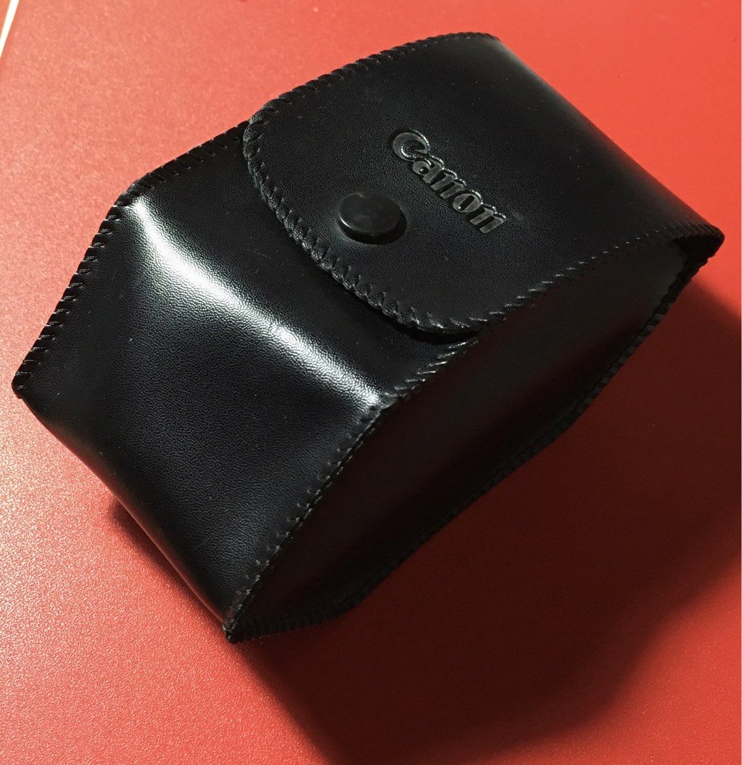 Canon Speedlite 300EZ Flash Case (Category: Other Photography Accessories) located in Tarlac. Submitted by greatfindstrlc (Listing ID 1452728762, Image 2). Description: Vintage shoe-mounted camera EOS film units flash case. Black synthetic material, with embossed Canon logo on the front flap. .