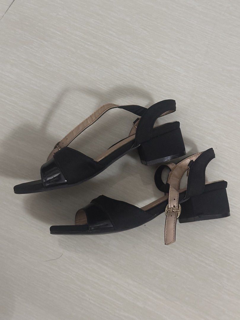 Chelsea Black Block Heel Sandals with Ankle Strap (Category: Heels) located in Pasay City. Submitted by a.daneee (Listing ID 1452844937, Image 2). Description: - Chic black block heel sandals - Features a glossy patent toe strap - Secure and adjustable ankle strap - 'CHELSEA' brand subtly displayed on the insole - Comfortable heel height, ideal for all-day wear - Versatile design: dress up or down effortlessly.