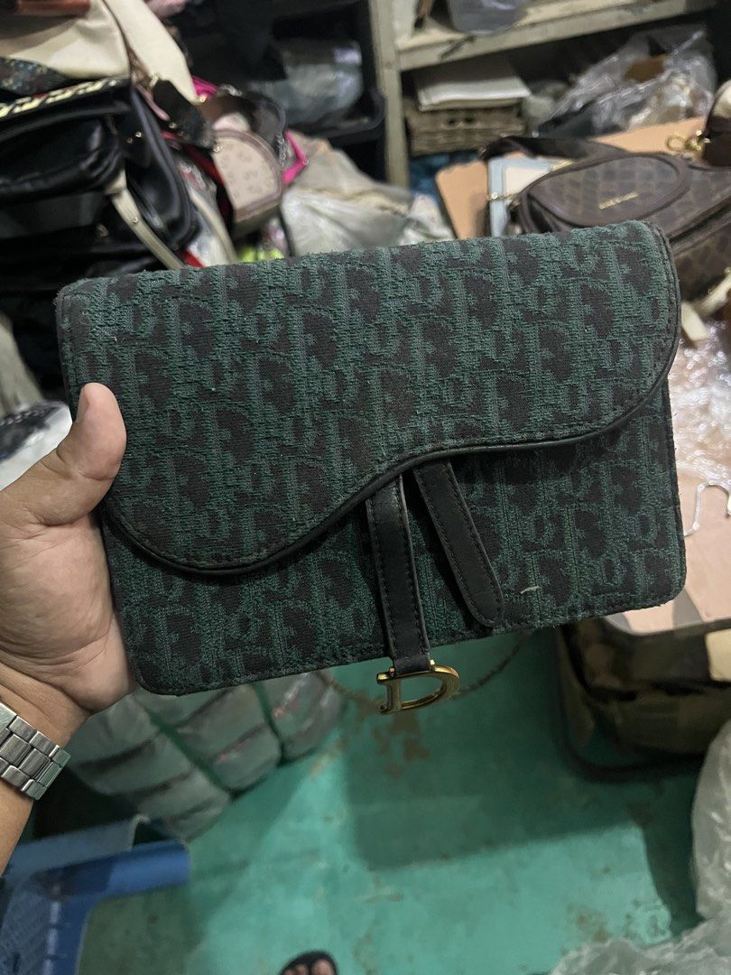 Christian Dior Trotter Saddle Bag Green Monogram (Category: Luxury Bags & Wallets) located in Manila. Submitted by keentiger-a5a0 (Listing ID 1452849838, Image 3). Description: - Authenticity not garanteed Christian Dior Saddle Bag - Iconic Trotter Monogram Pattern (Green & Black) - Genuine Leather Trim - Gold-tone Hardware - Secure Zipper Closure - Serial Number Included (Visible Inside) - Versatile for Everyday or Special Events.