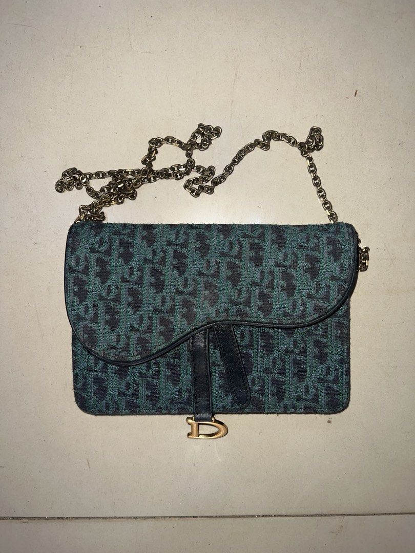 Christian Dior Trotter Saddle Bag Green Monogram (Category: Luxury Bags & Wallets) located in Manila. Submitted by keentiger-a5a0 (Listing ID 1452849838, Image 1). Description: - Authenticity not garanteed Christian Dior Saddle Bag - Iconic Trotter Monogram Pattern (Green & Black) - Genuine Leather Trim - Gold-tone Hardware - Secure Zipper Closure - Serial Number Included (Visible Inside) - Versatile for Everyday or Special Events.
