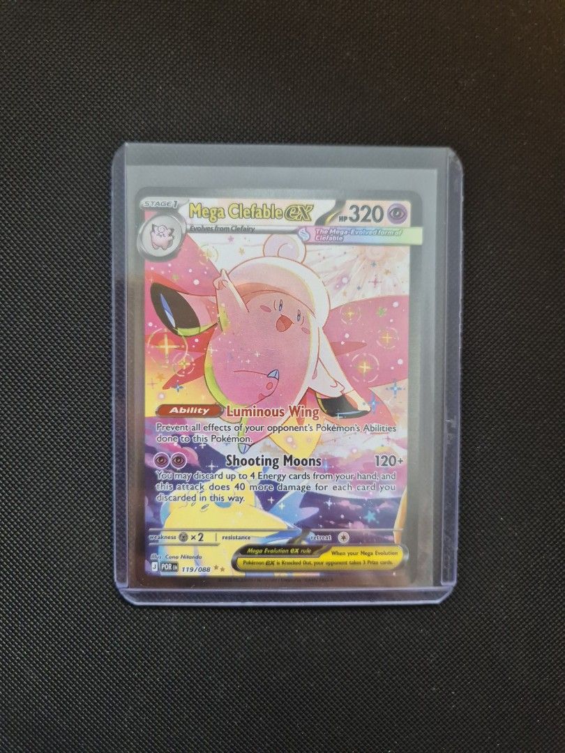 Clefable card (Category: Raw Cards) located in Singapore. Submitted by bluedabee (Listing ID 1452762001, Image 1). Description: - Pokemon Card: Mega Clefable EX - Card Number: 119/108 - Special Attack: Shooting Moons - Condition: Comes in a protective sleeve - Ideal for: Pokemon card collectors.