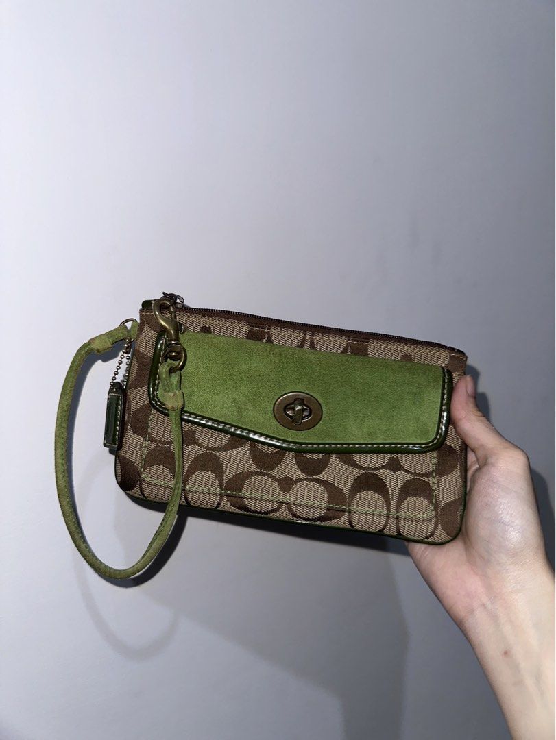 Coach Wristlet Green Suede (Category: Luxury Bags & Wallets) located in Manila. Submitted by preloved_avenueph (Listing ID 1452854877, Image 1). Description: No issue Pm for more details.