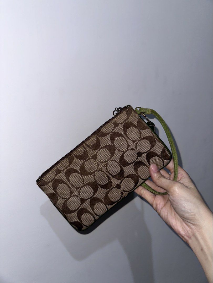 Coach Wristlet Green Suede (Category: Luxury Bags & Wallets) located in Manila. Submitted by preloved_avenueph (Listing ID 1452854877, Image 2). Description: No issue Pm for more details.
