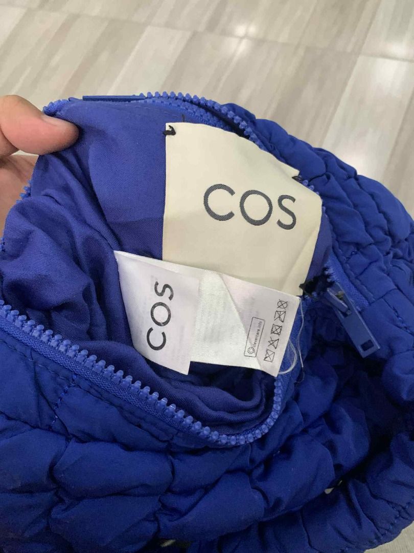 COS Quilted Bag Blue(Small) (Category: Shoulder Bags) located in Las Pinas. Submitted by dhliacmp (Listing ID 1452859105, Image 2). Description: - Blue quilted bag from COS - Puffy, soft material - Zipper closure - Comfortable shoulder strap - Ideal for everyday use - Fits essentials - Easy to carry - Stylish and modern look - Adds a pop of color to any outfit.