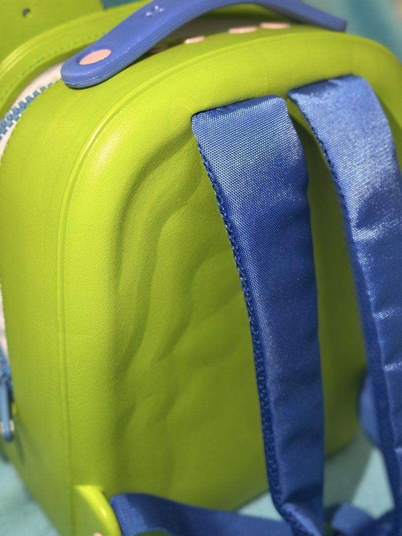 Crocs Classic Backpack or Kiddie Rubber Backpack) (Category: Babies & Kids Fashion) located in San Miguel. Submitted by meseszy (Listing ID 1452744572, Image 3). Description: - Fun green backpack for kids - Adorable cartoon charms: Spongebob, dog, car - Two adjustable straps - Main compartment with zipper closure - Bright green interior lining - Ideal for school, daycare, or outings - Your child will adore this playful design!.