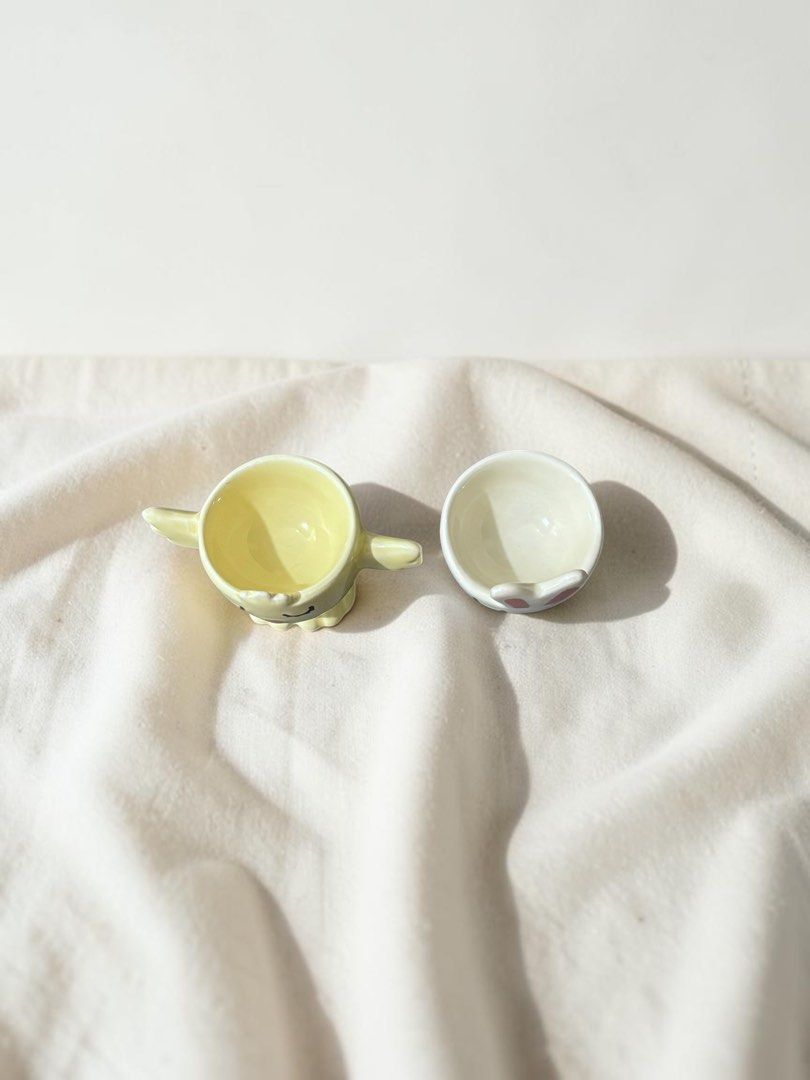 Cute Ceramic Chick and Bunny Egg Cups Set (Category: Coffee & Tea Tableware) located in Bulacan. Submitted by mingchifinds (Listing ID 1452705088, Image 3). Description: Ceramic Chick & Bunny Egg Holders Dimensions • W: 4.5cm • H: 4.4 cm 🤍 Condition: 9.5/10 🧡 Brand new with minor factory imperfections on the bottom, as shown in the photos. Cosmetic only..