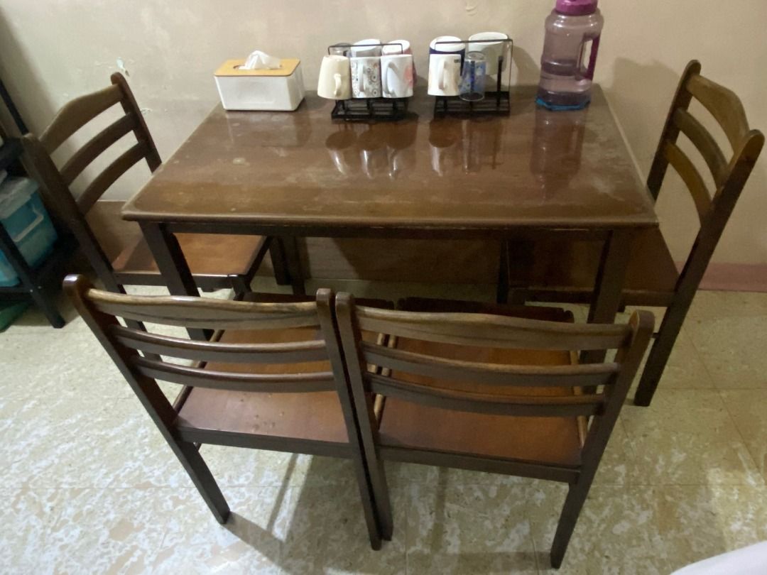 Dining Table - 4 seater (Category: Tables & Sets) located in Taguig. Submitted by shansiy (Listing ID 1452781069, Image 1). Description: Moving out sale!!! **Dining table with 4 chairs - ₱3,000 (From ₱3,500) Issue: With signs of usage, need lang higpitan screw ng chairs pero goods na goods pa 👌 W - 43.5 inches D - 27.5 inches 📍Ususan, Taguig Landmark: Shell Pateros and Puregold Jr Ususan For self pick up only! Thank you 😊.