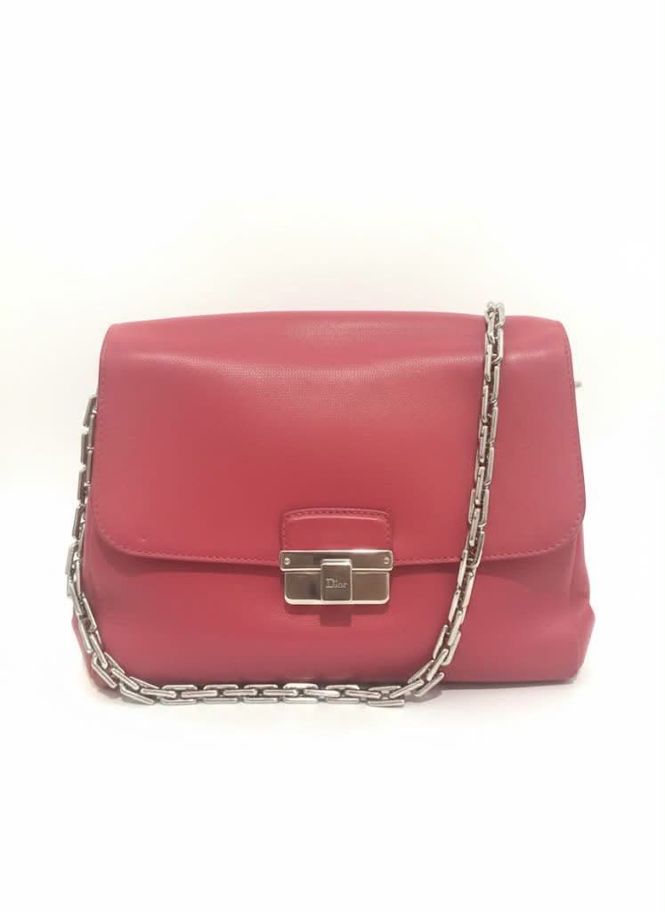 Dior Pink Leather Chain Shoulder Bag (Category: Luxury Bags & Wallets) located in Cainta. Submitted by ginamit (Listing ID 1452701616, Image 1). Description: - Authentic pink Dior shoulder bag. - Genuine leather material - Elegant silver chain strap - Secure front clasp closure with iconic Dior logo - Adds a vibrant pop of color to your look - Versatile for both daytime and evening wear ***100% authentic. Full refund plus ₱5,000 if the item is co
