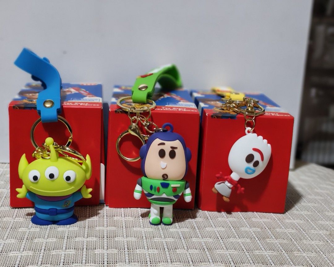 Disney Pixar Toy Story Character Keychains (Category: Character Goods) located in Quezon City. Submitted by danilo.danilo4 (Listing ID 1452807729, Image 2). Description: - Get all three iconic Toy Story characters: Alien, Buzz Lightyear, and Forky! - Each keychain comes in its original, unopened box. - Perfect for decorating your bags, backpacks, or keys. - An ideal gift for any dedicated Toy Story fan. - Limited stock available – don't miss out!