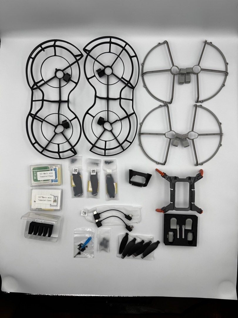 DJI Mavic Mini Propeller Guards, Propellers, and More (Category: Drones) located in Manila. Submitted by mysticstar_d67ad3_tree (Listing ID 1452850195, Image 1). Description: - Complete accessory bundle for DJI Mavic Mini - Includes black and grey propeller guards - Extra propellers for extended flight time - Tempered glass screen protectors for display safety - Charging cables included - Landing gear extender for stable takeoffs and landings - S