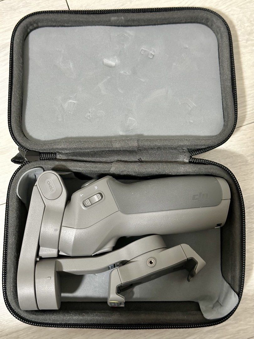 DJI OSMO Mobile 3 Gimbal Stabilizer with Case (Category: Gimbals & Stabilizers ) located in Las Pinas. Submitted by tomarigato (Listing ID 1452702872, Image 1). Description: - DJI Osmo Mobile 3 gimbal stabilizer - Compact and foldable design for easy storage and travel - Includes original protective case - Achieve smooth, professional-looking video footage with your smartphone - Built-in USB charging port - Integrated zoom controls RFS: Declutter
