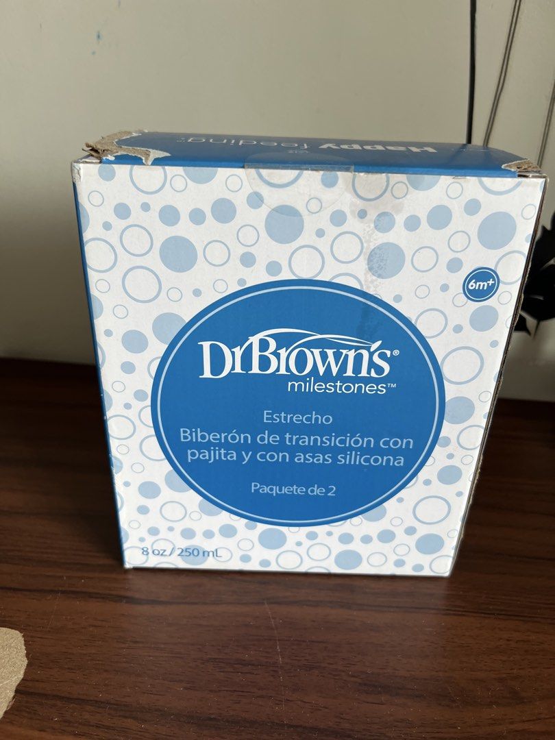 Dr. Brown's Milestones Narrow Sippy Straw Bottle 2-Pack (Category: Breastfeeding & Bottle Feeding) located in Mandaluyong City. Submitted by luna_elisse (Listing ID 1452754151, Image 2). Description: - Dr. Brown's Milestones Narrow Sippy Straw Bottles - Comes in a 2-pack - Each bottle is 8 oz / 250 mL - Features easy-grip silicone handles - Suitable for babies 6 months and up - Ideal for transitioning to straw drinking -gift from US -bought in US