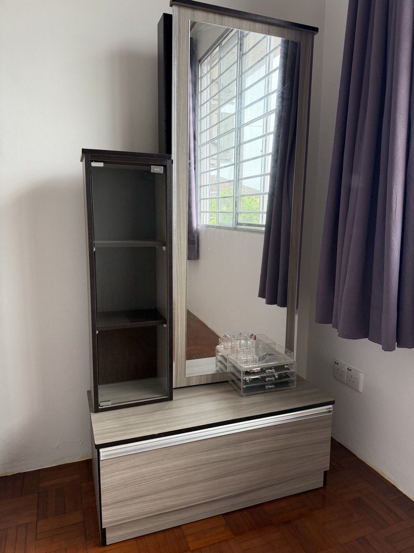 Dressing Table + Side table+ Stool (Category: Shelves, Cabinets & Racks) located in Sibu. Submitted by decemberies (Listing ID 1452734868, Image 1). Description: Moving out clerance. This is my dressing table rarely use as it’s at my hometown. In good condition. Height around 170cm. Sliding Mirror with more compartment behind and drawer at the bottom. Self pick up. The stool PU has defect because of dryness maybe will recover after polished as it