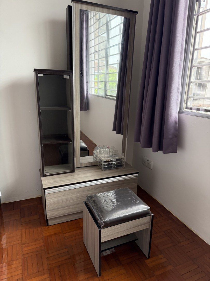 Dressing Table + Side table+ Stool (Category: Shelves, Cabinets & Racks) located in Sibu. Submitted by decemberies (Listing ID 1452734868, Image 2). Description: Moving out clerance. This is my dressing table rarely use as it’s at my hometown. In good condition. Height around 170cm. Sliding Mirror with more compartment behind and drawer at the bottom. Self pick up. The stool PU has defect because of dryness maybe will recover after polished as it