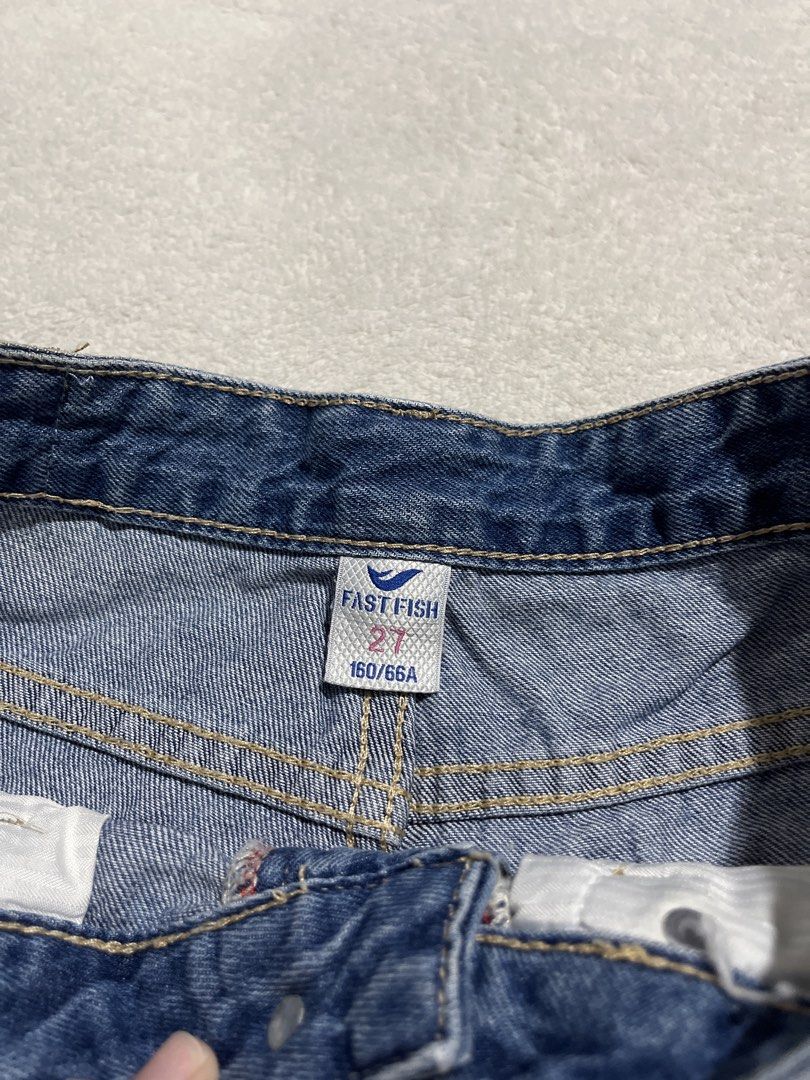 Fast Fish Ripped Denim Shorts Size 27 (Category: Shorts) located in Caloocan City. Submitted by unicakczxc (Listing ID 1452794767, Image 3). Description: - Blue denim 🩳 - Size 27 - Distressed rips and frayed hem - Ombre effect (blue to white) - Cute sun embroidery on back pocket - Button and zip closure USED BUT NOT ABUSED GOOD AS NEW DECLUTTERING.