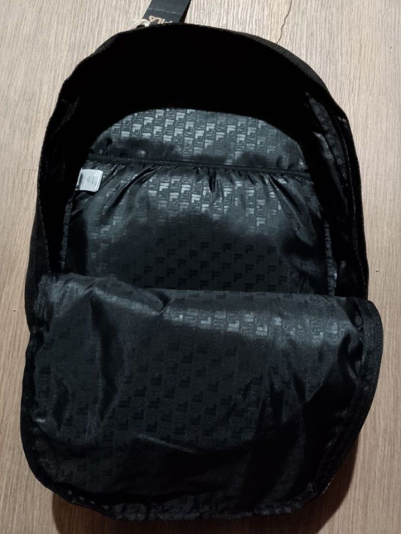 FILA Fussa Backpack Vertical Plain Black (Category: Backpacks) located in San Jose del Monte. Submitted by my_mochibonney (Listing ID 1452798560, Image 3). Description: Brand New with tags rucksack Authentic Backpack - FBU0125 selling price ₱2,000 shipped via J&T (orig price ₱2.8k on last pic) ~ Gcash, GoTyme, Maribank, Maya, Cash on meetup 📍Pasong Tamo, Q.C..