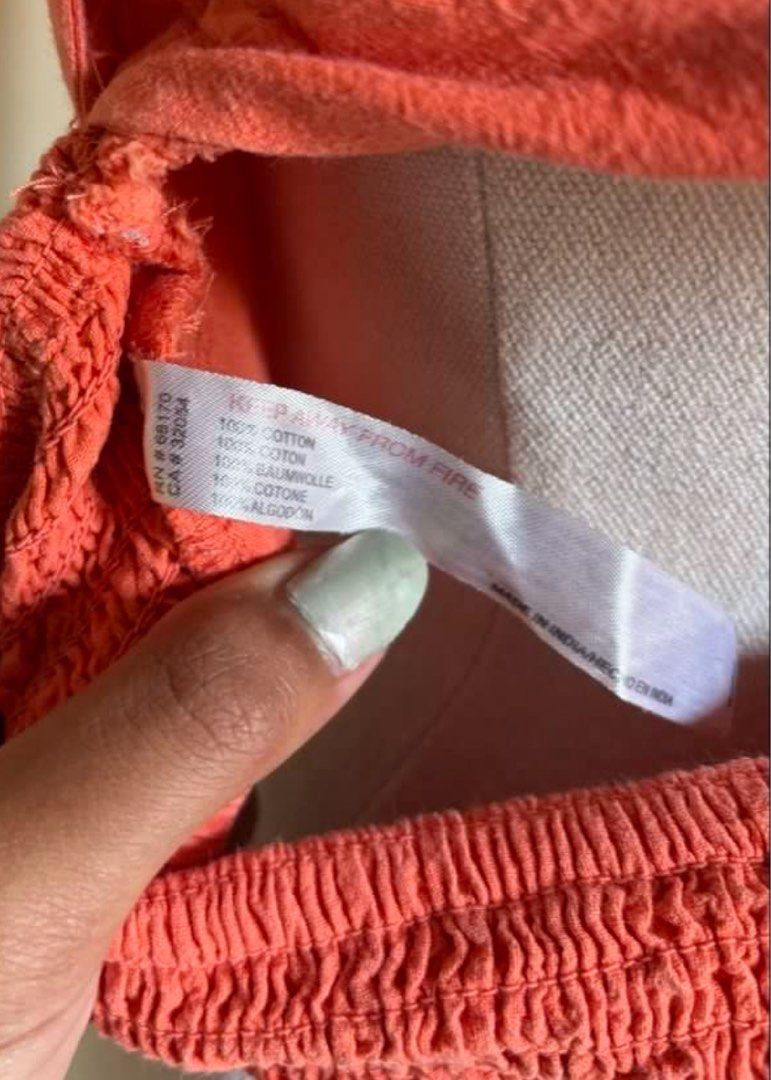 Free people 100% cotton orange top (Category: Sleeveless) located in Manila. Submitted by cokezer0__ (Listing ID 1452713356, Image 3). Description: So nice in actual!! :) fits everyone's skin color .