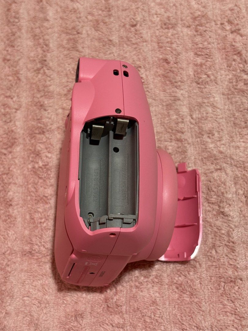 Fujifim Instax Mini 9 Pink (Category: Cameras) located in San Pedro. Submitted by luviestuff (Listing ID 1452732628, Image 3). Description: -Bought in Dubai -This is a buy at your own risk and strictly no refund and return -I won’t entertain questions about testing Original Price: 5000 ‼️Issue: -Untested if it works with battery and film (Pwede niyo naman pa check or ayos) -Stuck for a long time and not used .