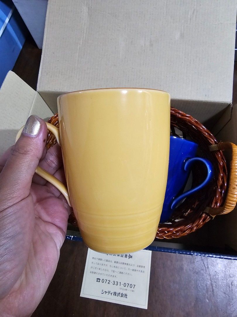 GIVENCHY Mugs with Basket (Category: Coffee & Tea Tableware) located in Quezon City. Submitted by senyoramaria (Listing ID 1452872626, Image 2). Description: GIVENCHY Porcelaine 2 Mugs 3.2 inches rim diameter 4 inches tall Basket included Brandnew with box..