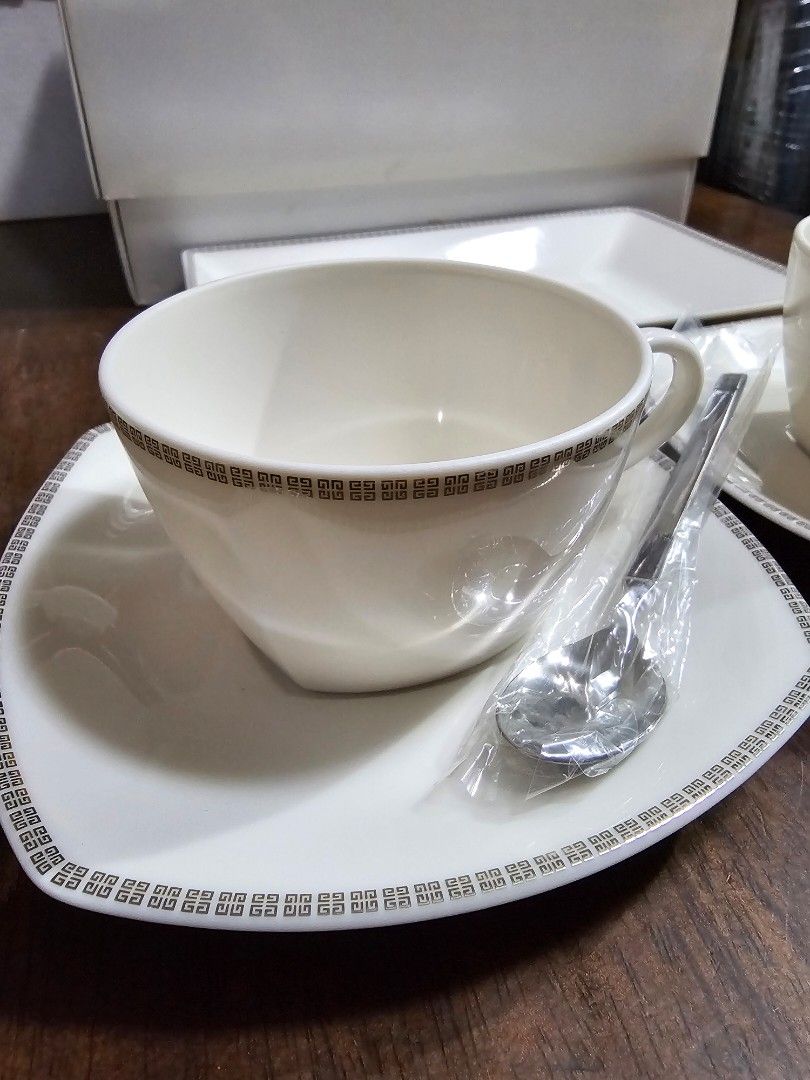 GIVENCHY Set - 7 pcs (Category: Coffee & Tea Tableware) located in Quezon City. Submitted by senyoramaria (Listing ID 1452873836, Image 2). Description: GIVENCHY 7 piece - Set 2 Duos Cups 3.5 inches rim diameter 2.1 inches tall Saucers 5.75 x 5.75 inches 1 Sandwich or Snack Plate 8.5 x 5.25 inches 2 Teaspoons Brandnew with box..