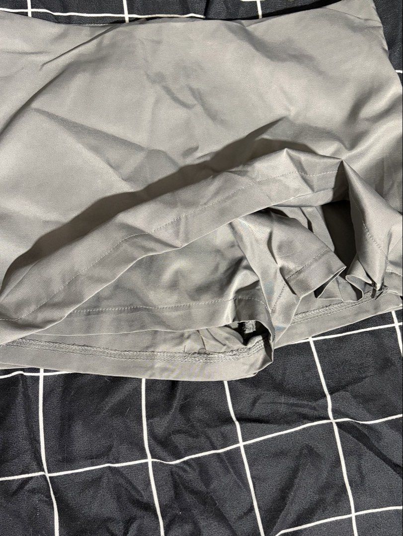 Grey Mini Skirt with Zipper Back (Category: Skirts) located in Pasay City. Submitted by a.daneee (Listing ID 1452836121, Image 2). Description: - Grey mini skirt - Zipper closure at the back - Two faux pockets on the back - Simple and versatile design - Perfect for dressing up or down.