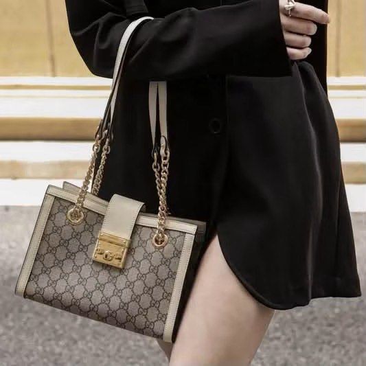 Gucci Padlock GG Supreme Canvas Shoulder Bag (Category: Luxury Bags & Wallets) located in Bacolod City. Submitted by novymaesel14868 (Listing ID 1452826250, Image 1). Description: - Authentic Gucci shoulder bag - Classic GG Supreme canvas (beige/ebony) - Cream leather trim - Gold-tone hardware - Secure lock closure - Chain strap for shoulder wear - Clean interior - Includes leather tag - Versatile for daily use or special occasions.