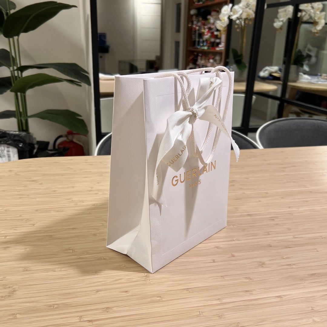 Guerlain | Paper Bags and Dedication Cards (Category: Luxury Bags & Wallets) located in Manila. Submitted by sojuandtini (Listing ID 1452739718, Image 3). Description: Paper bag small w ribbon - 150 (3 avail) fits lipstick to perfume (25cm x 19cm x 10cm) Paper bag large w ribbon - 250 (3 avail) fits skincare sets and boxes (33cm x 25cm x 13cm) Gift Envelope with Card - 50ea (3 avail) Large Limited Ed Card - 150 (1 avail) Extras - 100 takeall - ti