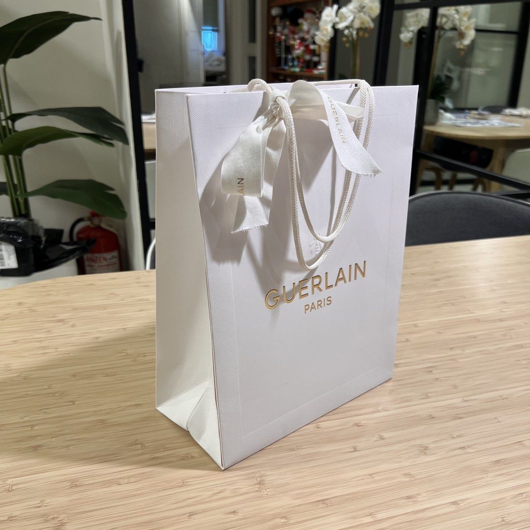 Guerlain | Paper Bags and Dedication Cards (Category: Luxury Bags & Wallets) located in Manila. Submitted by sojuandtini (Listing ID 1452739718, Image 2). Description: Paper bag small w ribbon - 150 (3 avail) fits lipstick to perfume (25cm x 19cm x 10cm) Paper bag large w ribbon - 250 (3 avail) fits skincare sets and boxes (33cm x 25cm x 13cm) Gift Envelope with Card - 50ea (3 avail) Large Limited Ed Card - 150 (1 avail) Extras - 100 takeall - ti