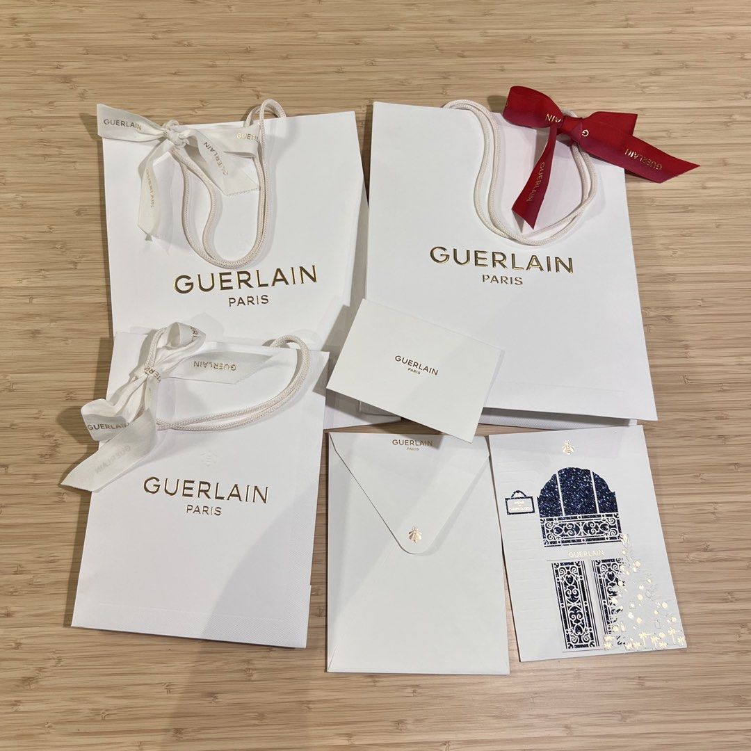 Guerlain | Paper Bags and Dedication Cards (Category: Luxury Bags & Wallets) located in Manila. Submitted by sojuandtini (Listing ID 1452739718, Image 1). Description: Paper bag small w ribbon - 150 (3 avail) fits lipstick to perfume (25cm x 19cm x 10cm) Paper bag large w ribbon - 250 (3 avail) fits skincare sets and boxes (33cm x 25cm x 13cm) Gift Envelope with Card - 50ea (3 avail) Large Limited Ed Card - 150 (1 avail) Extras - 100 takeall - ti