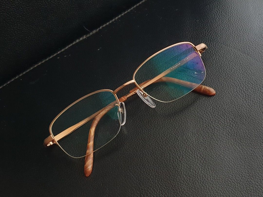Half-rim Titanium Eyeglass Frame (Category: Sunglasses & Eyewear) located in Quezon City. Submitted by WasalakTwo (Listing ID 1452802866, Image 3). Description: Bought in Japan Durable and high quality Goodcondition Still presentable Lens are graded, but replaceable Open for delivery nationwide Front Width 14.1cm Front Height 3.7cm.