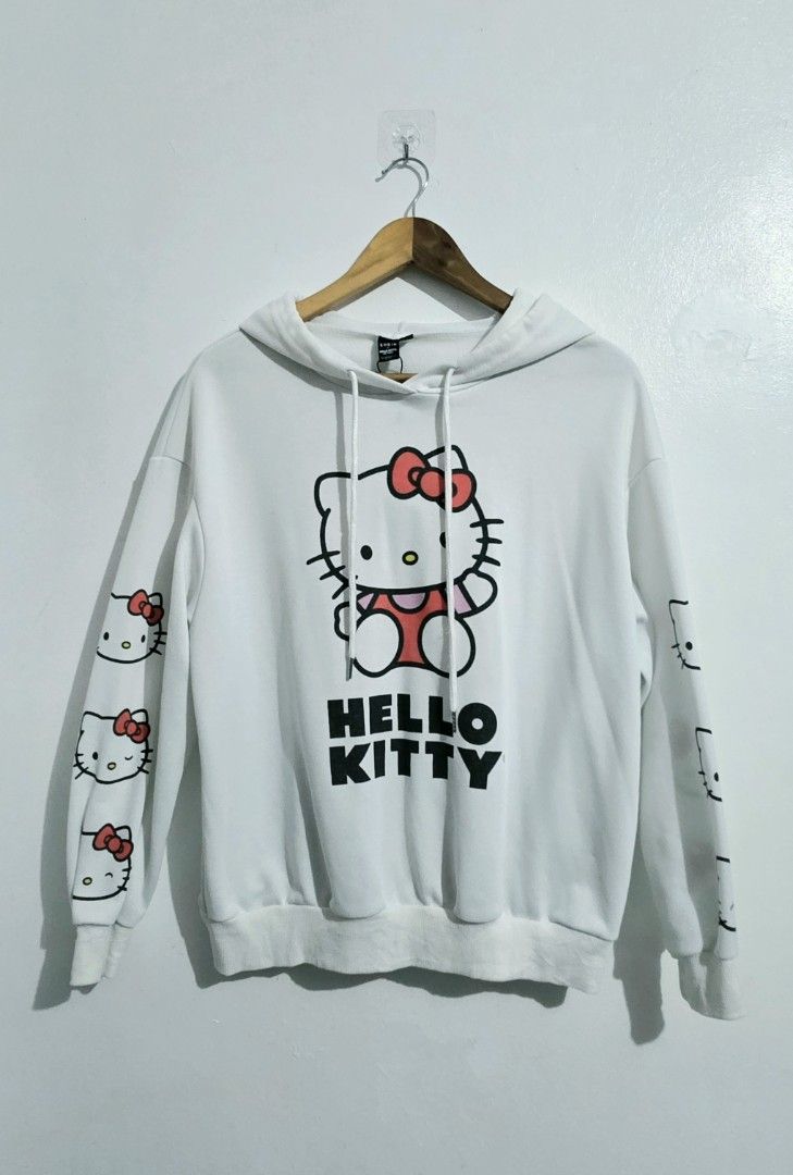 Hello Kitty White Hoodie Jacket (Category: Coats, Jackets and Outerwear) located in Malolos. Submitted by candyproj (Listing ID 1452832760, Image 1). Description: SHEIN | Personal Used Clothes Size: Small on tag but can fit till Medium Measurement: Bust: till 40" Length: 25" Buy 3 clothes, SHIPPING FEE IS FREE RFS: Decluterring/Migrating Price is Negotiable Everything must go.