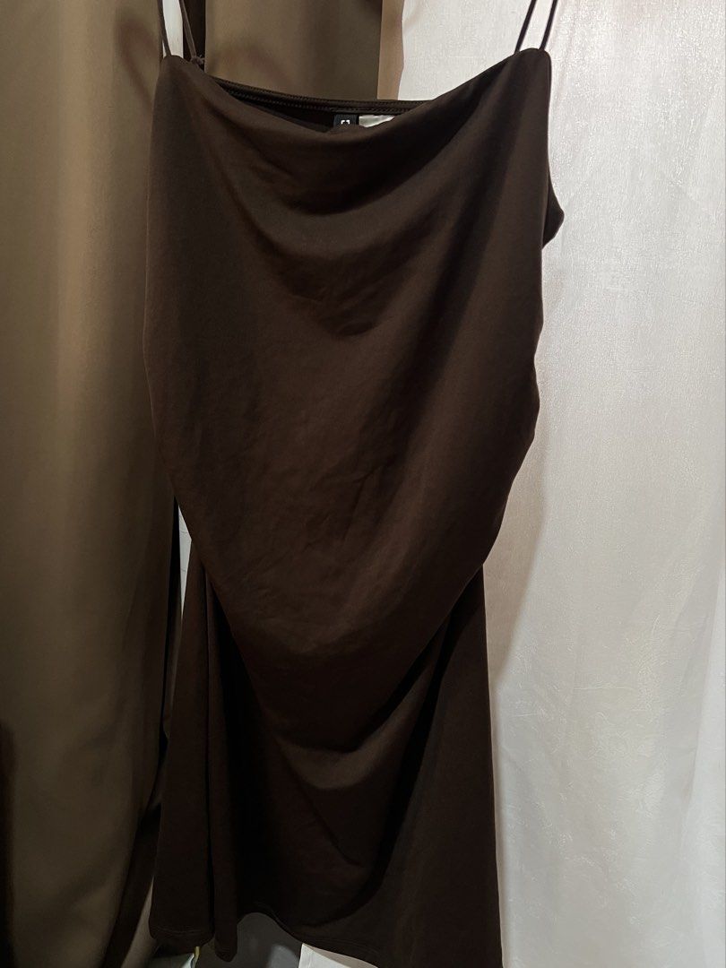 H&M Brown Draped Slip Dress (Category: Dresses) located in Las Pinas. Submitted by reiclutter (Listing ID 1452714084, Image 2). Description: - H&M - Size: Medium (M) - Features: Spaghetti straps, draped front - Condition: Brand new. Never worn but nag loose na yung thread niya sa may strap (need stitching). .