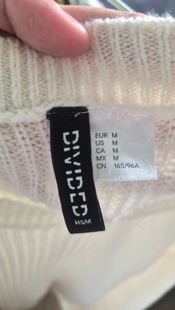 H&M Divided Cream Knit Wrap Sweater (Category: Longsleeves) located in Manila. Submitted by vimcorpuz (Listing ID 1452836869, Image 2). Description: - Cream knit sweater from H&M Divided - Wrap-around tie detail - Long sleeves with ribbed cuffs .