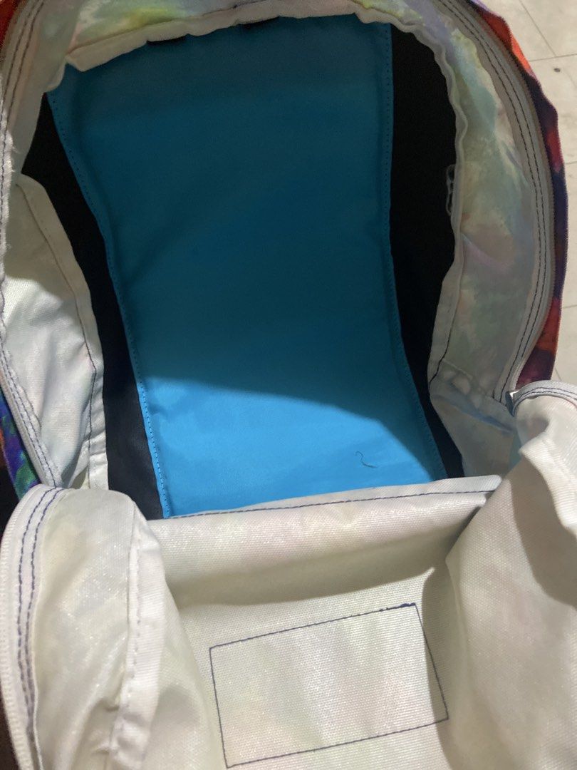 Jansport Backpack - Colorful Tie-Dye Print (Category: Backpacks) located in Taguig. Submitted by billpogi23 (Listing ID 1452810423, Image 3). Description: - Classic Jansport backpack with a vibrant tie-dye print. - Features a convenient front zippered pocket. - Spacious main compartment for all your essentials. - Padded straps for comfortable carrying. - Ideal for school, college, or everyday adventures..