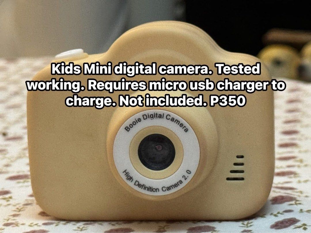Kids Mini Digital Camera - Tested Working (Category: Cameras) located in Cainta. Submitted by elainelawenko (Listing ID 1452815238, Image 1). Description: - Tested yellow mini digital camera for kids. - Fully functional: takes photos and features a screen with icons. - Rechargeable via micro USB (charger not included). - Ideal for children to discover photography..