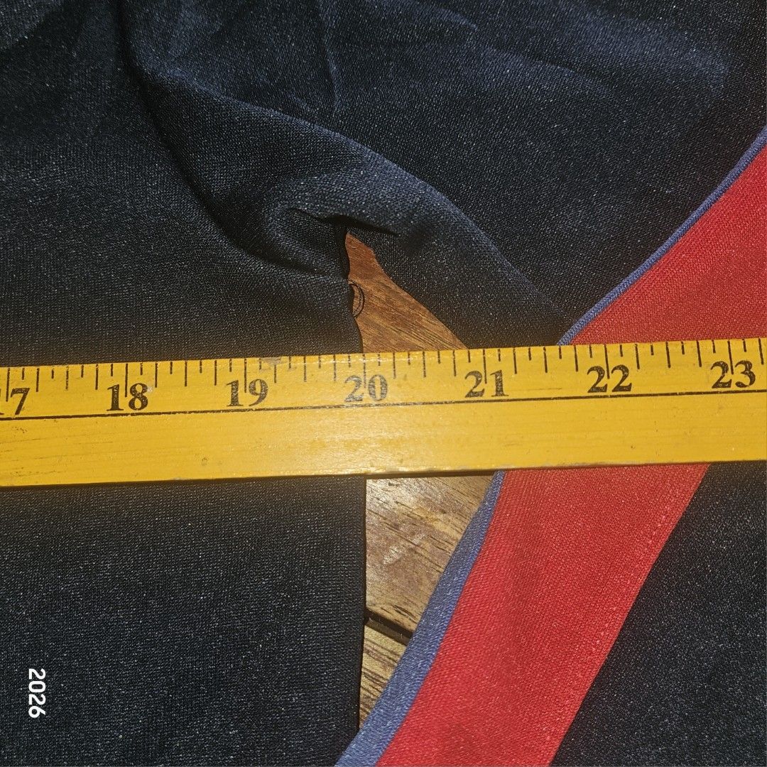 K-Swiss Track Jacket Navy Red Blue Size M (Category: Coats, Jackets and Outerwear) located in Bislig. Submitted by edisontv (Listing ID 1452731864, Image 3). Description: - Classic K-Swiss track jacket - Color: Navy blue with red and blue sleeve/collar stripes - Features K-Swiss logo with "Court Style Since 1966" print - Includes an American flag patch - Material: 86% polyester, 14% cotton - Tagged Size: M - Ideal for casual wear or sports activi