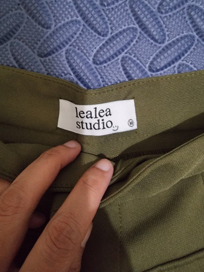 Lea lea Studio Olive Green Cargo Shorts Size M (Category: Shorts) located in Lopez. Submitted by declutteringproxie (Listing ID 1452720578, Image 3). Description: - Brand: Lealea Studio Bangkok - Color: Olive Green - Style: Cargo Shorts - Waist: High-waisted - Pockets: Two front pockets - Size: Medium (M) - Occasion: Casual wear RFS: wrong size.