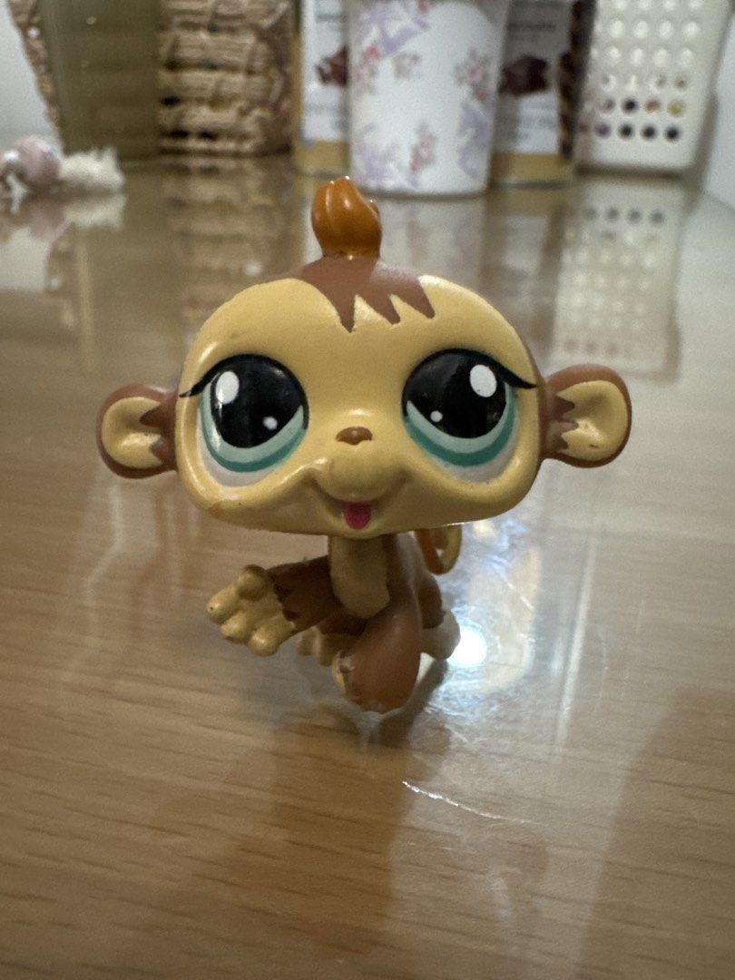 Littlest Pet Shop Monkey Toy (Category: Kids Toys) located in Pasig City. Submitted by acffashion31 (Listing ID 1452717800, Image 1). Description: - Adorable monkey toy - Features big eyes and a playful expression - Distinctive curled tail - Perfect for LPS collectors or children - In good, pre-loved condition.