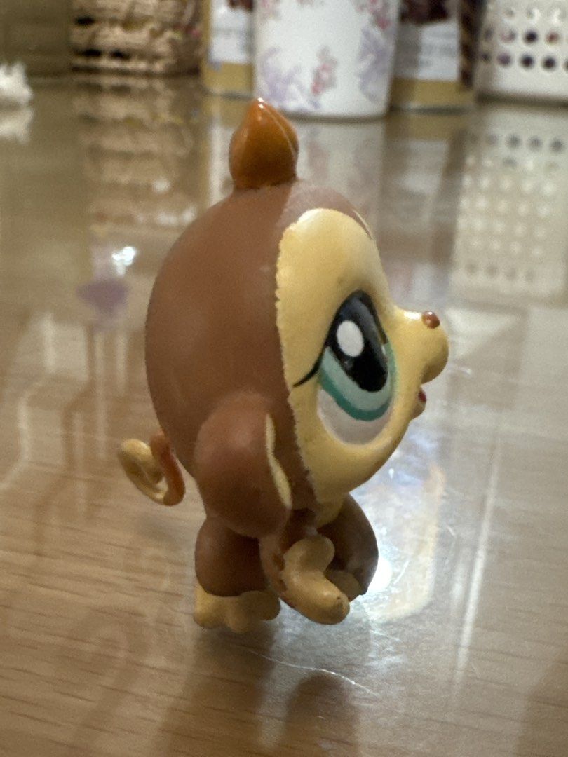 Littlest Pet Shop Monkey Toy (Category: Kids Toys) located in Pasig City. Submitted by acffashion31 (Listing ID 1452717800, Image 2). Description: - Adorable monkey toy - Features big eyes and a playful expression - Distinctive curled tail - Perfect for LPS collectors or children - In good, pre-loved condition.