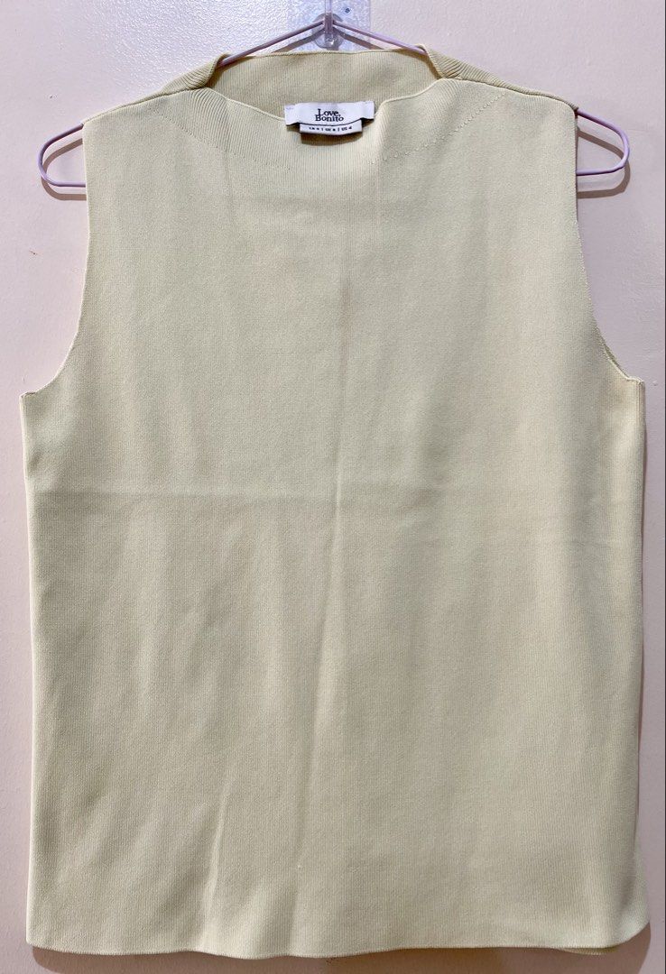 ‼️Sale‼️ Love Bonito Sleeveless Knit Top (Category: Sleeveless) located in Quezon City. Submitted by thebusybeee (Listing ID 1452773747, Image 1). Description: - Mint Green sleeveless knit top from Love Bonito - Ribbed texture all over - High neckline - Versatile for layering or wearing alone - Fits size Small to Semi Large - Stretchable fabric Pit to pit/Bust: 34-38 Width: 34-38 Length: 23 .