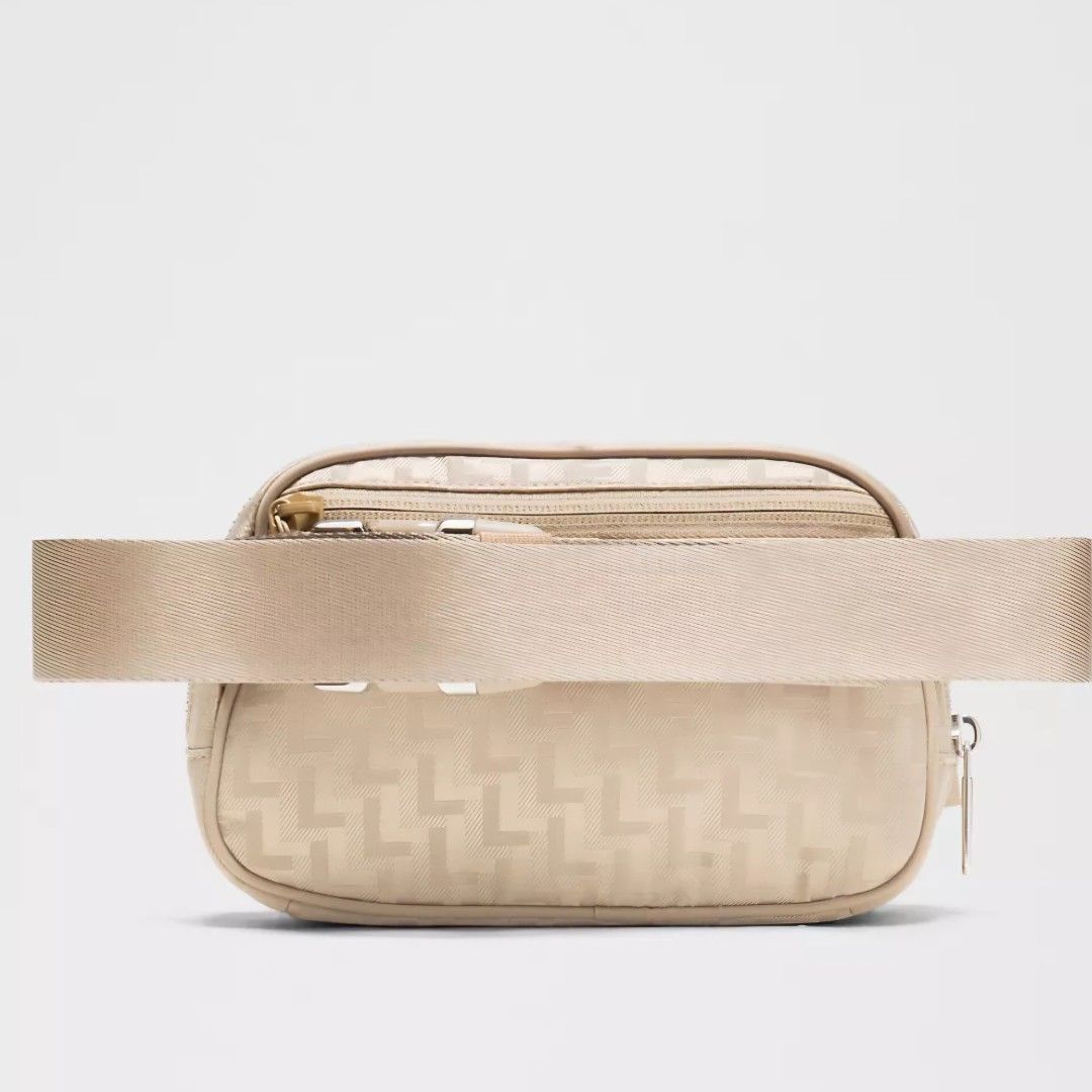 Lululemon Everywhere Belt Bag Jacquard Monogram L (Category: Cross-body Bags) located in Bulacan. Submitted by bnbig (Listing ID 1452738705, Image 3). Description: Knit jacquard fabric is softly structured Adjustable strap Exterior zippered pocket to secure your valuables . Interior pockets hold Ahe essentials . Dimensions: W 19cm x D 5cm x H 13cm (7.5 x 2" x 5") Volume:1L Sheer Oak color.