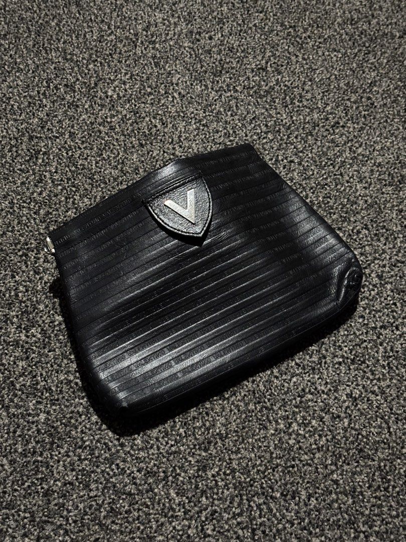 Mario Valentino Clutch Bag Embossed Logo (Category: Clutches) located in Bulacan. Submitted by thriftstarph (Listing ID 1452790709, Image 2). Description: PLEASE READ THE DESCRIPTION BELOW‼️ Mario Valentino Clutch Bag Embossed Logo Iconic V Logo From: Japan No Box Issue: Minor Flaws NEGOTIABLE .
