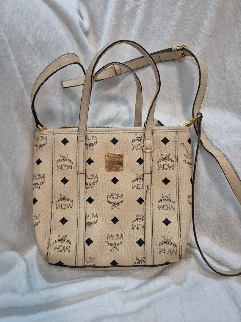 MCM Mini Aren Tote Bag (Category: Luxury Bags & Wallets) located in Cebu City. Submitted by chocowaffol (Listing ID 1452763073, Image 1). Description: authentic mcm issue: needs repair rubber lining hardware needs polishing .