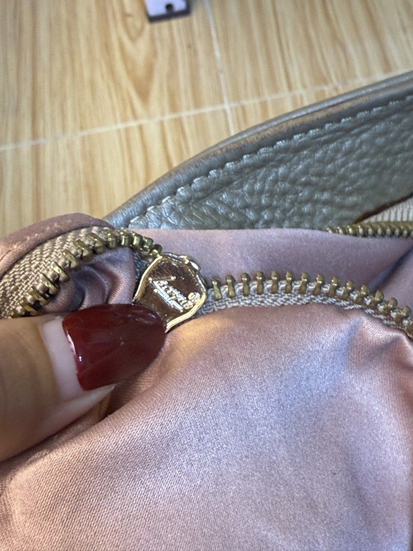 Miu miu totebag (Category: Luxury Bags & Wallets) located in Manila. Submitted by prince051097 (Listing ID 1452809812, Image 2). Description: - Lightweight and spacious tote bag - Made of soft, textured leather - Pretty pink satin interior lining - Secure zipper closure - Elegant gold-tone hardware - Ideal for everyday use or travel.