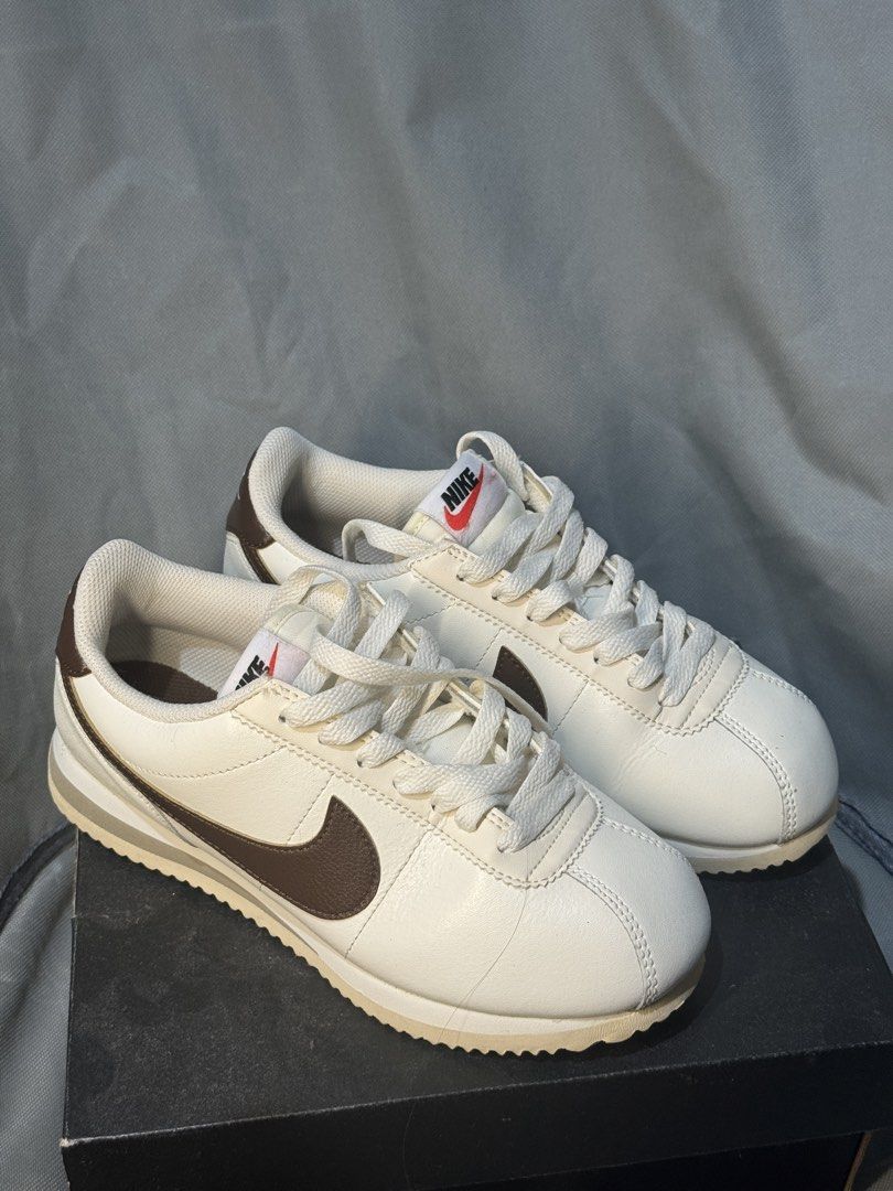 Nike Cortez Cacao (Category: Sneakers) located in Manila. Submitted by acbdacbd (Listing ID 1452864139, Image 1). Description: - Classic Nike Cortez sneakers - White leather with brown swoosh and heel tab - Secure lace-up closure - Comfortable and stylish for everyday wear - Perfect for casual outfits.