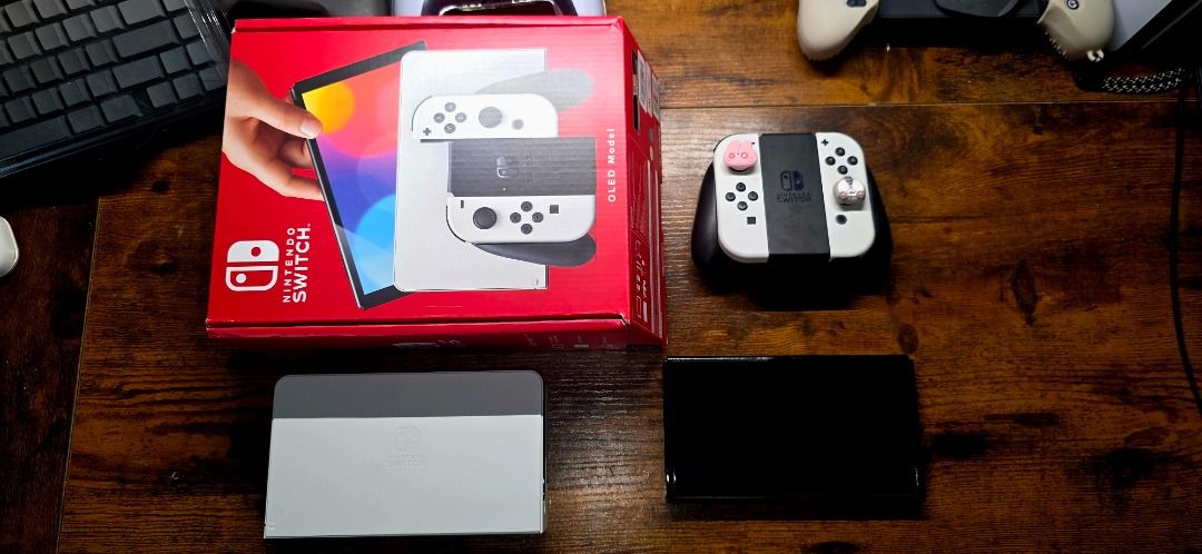 Nintendo Switch OLED White | Complete with Box | Like New (Category: Nintendo) located in Bayambang. Submitted by daaneee (Listing ID 1452861533, Image 1). Description: Nintendo Switch OLED Model (White) Selling my Nintendo Switch OLED in excellent condition. I rarely have time to play anymore, so I've decided to let it go. Condition • Like New • 100% Working • Adult-owned • Well maintained • No hidden issues • Rarely used Inclusions • Nintendo S